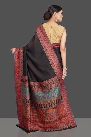 Shop stunning black tussar silk saree online in USA with kani embroidery. Look beautiful on weddings and special occasions in stunning Kanchipuram saris, pure silk sarees, handwoven saris from Pure Elegance Indian fashion store in USA.-back