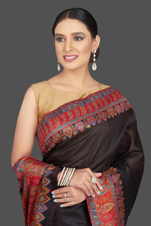 Shop stunning black tussar silk saree online in USA with kani embroidery. Look beautiful on weddings and special occasions in stunning Kanchipuram saris, pure silk sarees, handwoven saris from Pure Elegance Indian fashion store in USA.-closeup