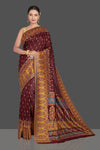 Shop stunning brown Kani embroidery tussar silk sari online in USA. Make your presence felt on special occasions in beautiful embroidered sarees, handwoven sarees, pure silk saris, tussar sarees from Pure Elegance Indian saree store in USA.-full view