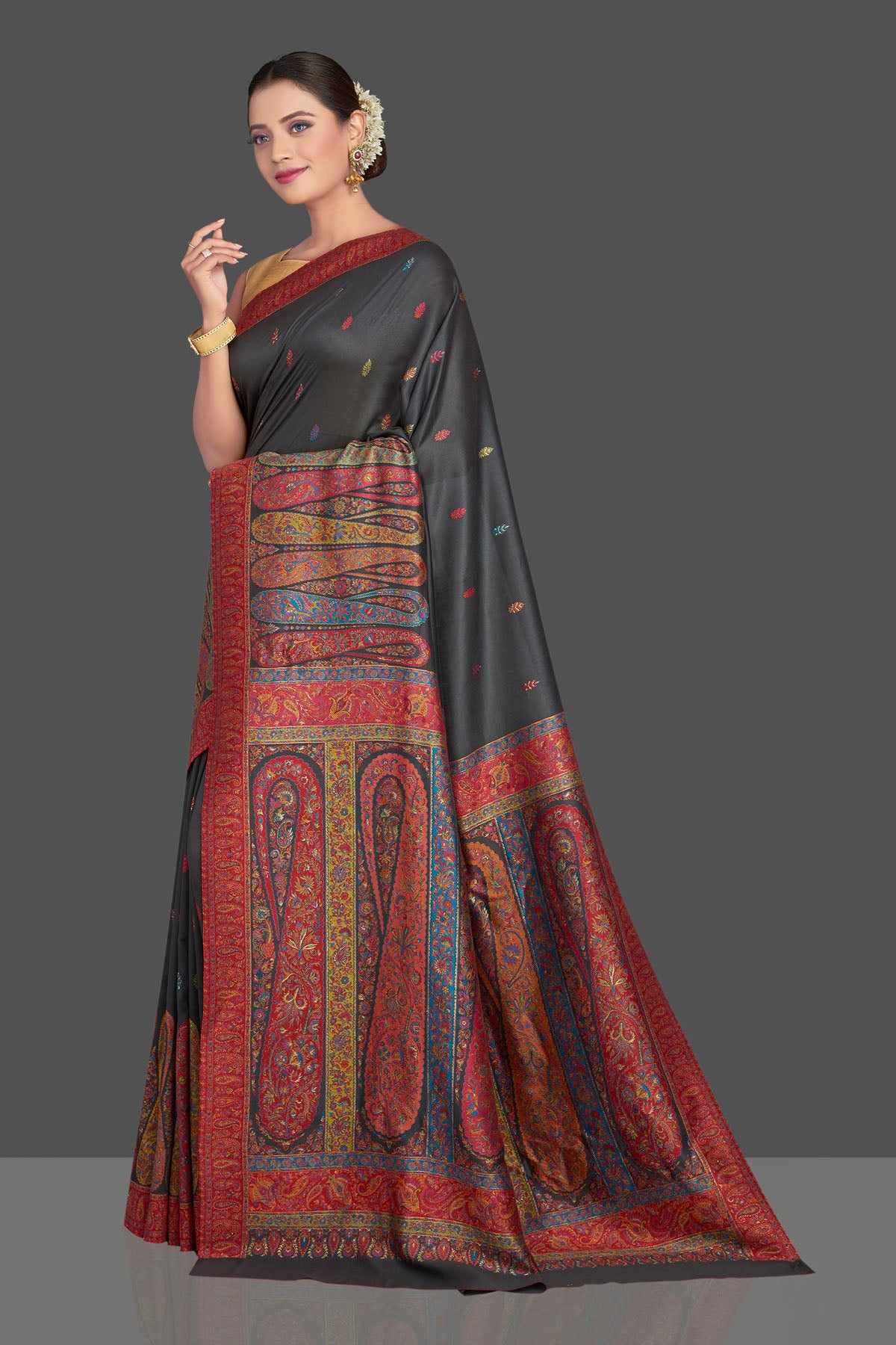 Shop stunning black tussar silk sari online in USA with multicolor Kani embroidery. Make your presence felt on special occasions in beautiful embroidered sarees, handwoven sarees, pure silk saris, tussar sarees from Pure Elegance Indian saree store in USA.-pallu