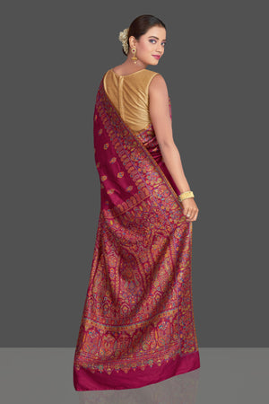 Shop beautiful magenta tussar silk sari online in USA with Kani embroidery. Make your presence felt on special occasions in beautiful embroidered sarees, handwoven sarees, pure silk saris, tussar sarees from Pure Elegance Indian saree store in USA.-back