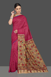 Shop beautiful pink Bandhani print gajji silk sari online in USA with beige Kalamkari pallu. Make your presence felt on weddings and special occasions in beautiful Kalamkari sarees, pure silk sarees, printed sarees from Pure Elegance Indian store in USA.-full view