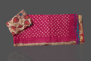 Shop beautiful pink Bandhani print gajji silk sari online in USA with beige Kalamkari pallu. Make your presence felt on weddings and special occasions in beautiful Kalamkari sarees, pure silk sarees, printed sarees from Pure Elegance Indian store in USA.-blouse