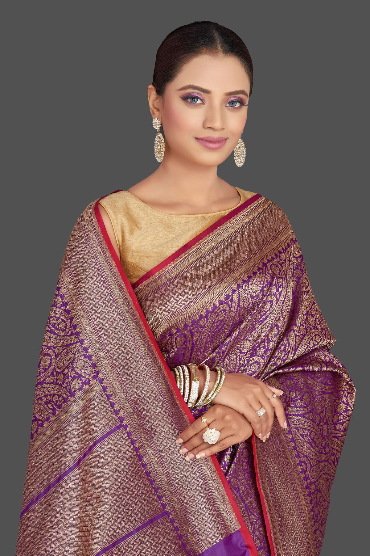 Shop stunning purple tussar Banarasi saree online in USA with overall zari work. Look your best on special occasions with stunning Banarasi sarees, pure silk sarees, tussar saris, handwoven sarees from Pure Elegance Indian saree store in USA.-closeup