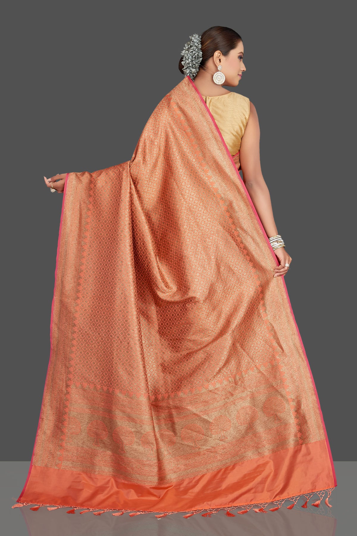 Shop gorgeous orange tussar Banarasi saree online in USA with overall zari work. Look your best on special occasions with stunning Banarasi sarees, pure silk saris, tussar saris, handwoven sarees from Pure Elegance Indian saree store in USA.-back