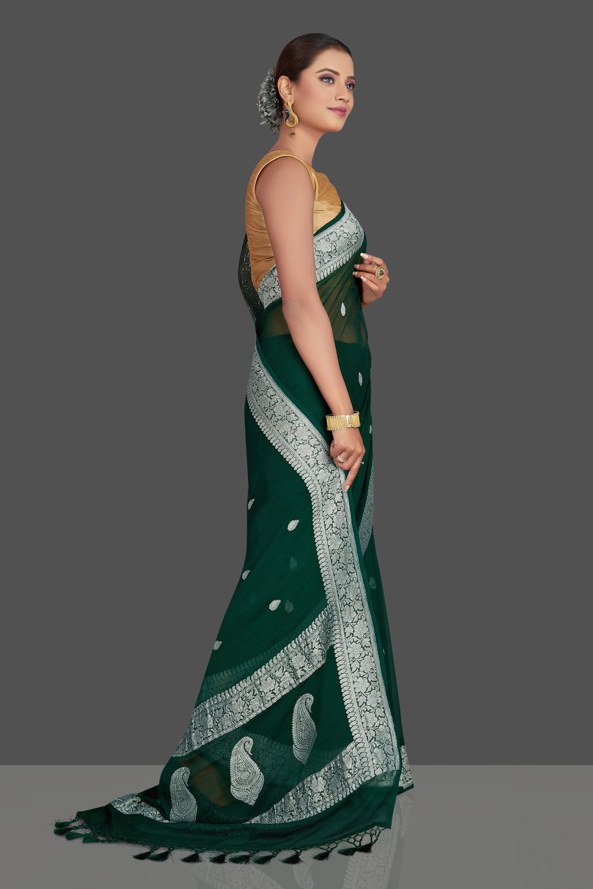 Buy beautiful dark green  chiffon georgette Banarasi sari online in USA with silver zari border. Look your best on special occasions with stunning Banarasi sarees, pure silk saris, tussar saris, handwoven sarees from Pure Elegance Indian saree store in USA.-side
