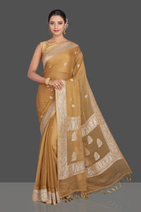 Buy beautiful beige chiffon georgette Banarasi saree online in USA with silver zari border. Look your best on special occasions with stunning Banarasi sarees, pure silk saris, tussar saris, handwoven sarees from Pure Elegance Indian saree store in USA.-full view