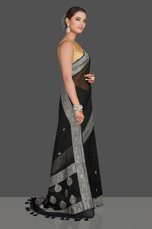 Shop gorgeous black chiffon georgette Banarasi saree online in USA with silver zari border. Look your best on special occasions with stunning Banarasi sarees, pure silk saris, tussar saris, handwoven sarees from Pure Elegance Indian saree store in USA.-side