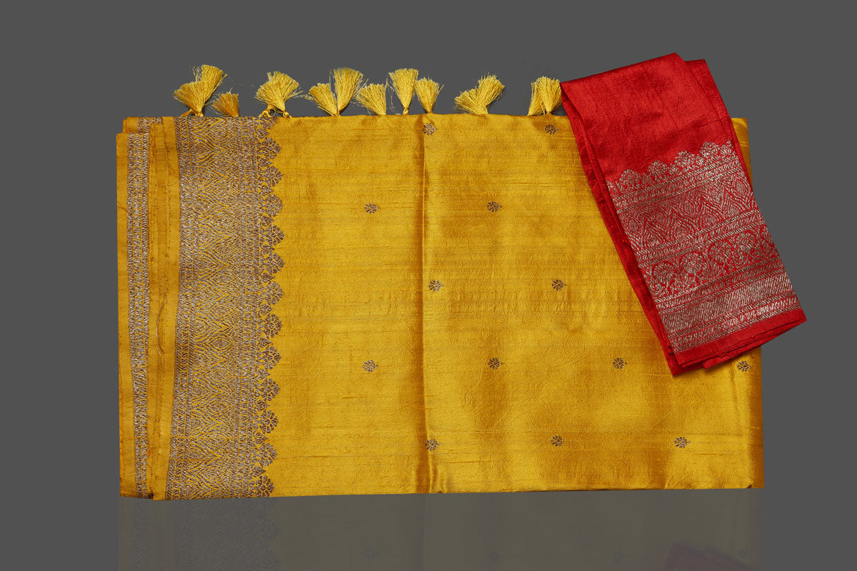 Shop gorgeous yellow tussar Banarasi saree online in USA with antique zari border. Look your best on special occasions with stunning Banarasi saris, pure silk saris, tussar sarees, handwoven sarees from Pure Elegance Indian saree store in USA.-blouse