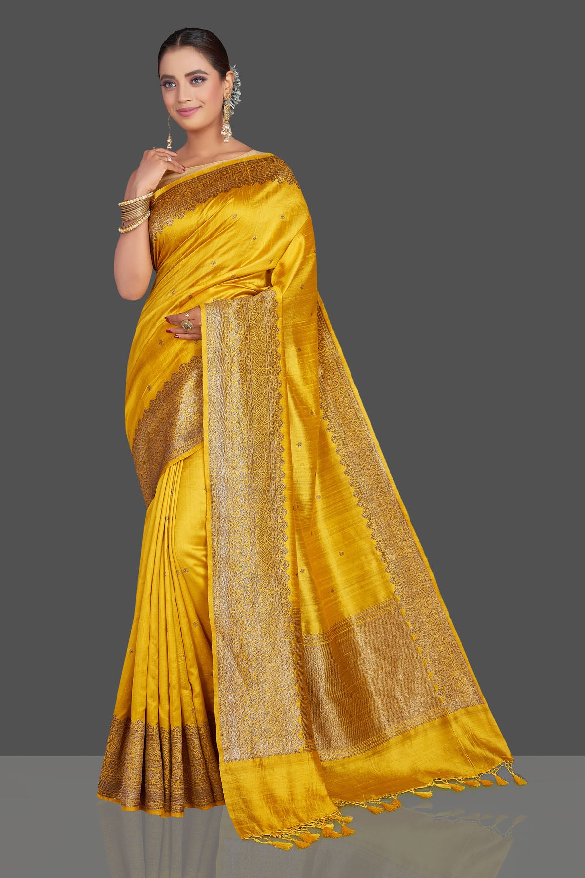 Shop gorgeous yellow tussar Banarasi saree online in USA with antique zari border. Look your best on special occasions with stunning Banarasi saris, pure silk saris, tussar sarees, handwoven sarees from Pure Elegance Indian saree store in USA.-front