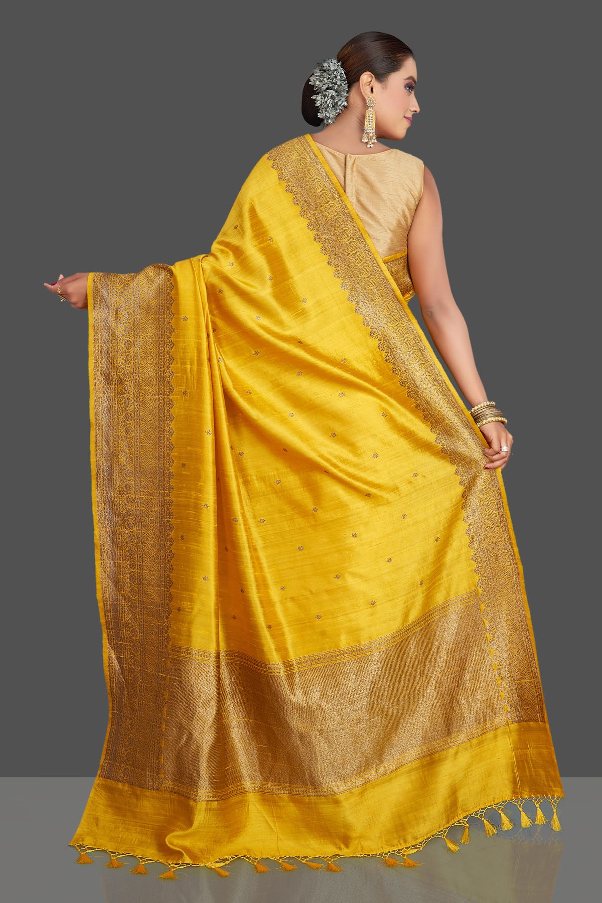 Shop gorgeous yellow tussar Banarasi saree online in USA with antique zari border. Look your best on special occasions with stunning Banarasi saris, pure silk saris, tussar sarees, handwoven sarees from Pure Elegance Indian saree store in USA.-back