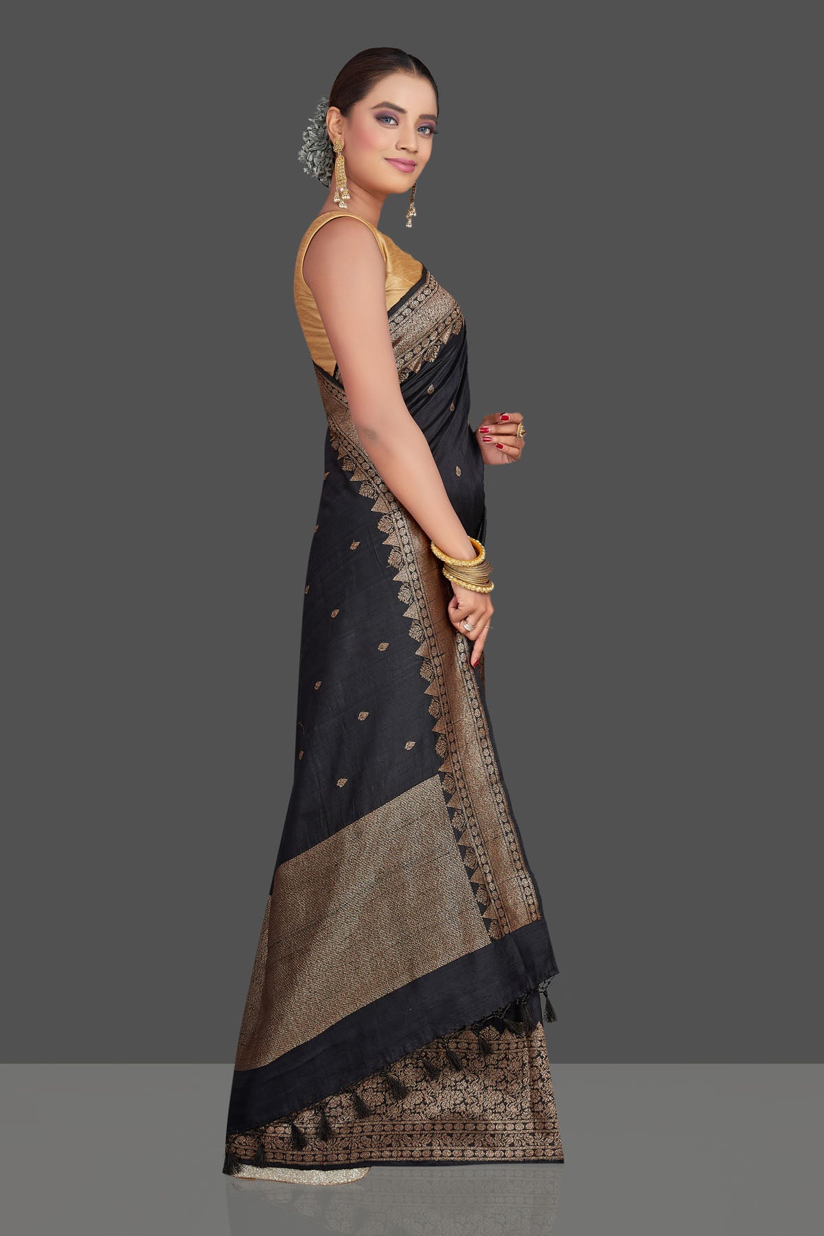 Shop black tussar Banarasi sari online in USA with antique zari border. Look your best on special occasions with stunning Banarasi saris, pure silk sarees, tussar sarees, handwoven sarees from Pure Elegance Indian saree store in USA.-side