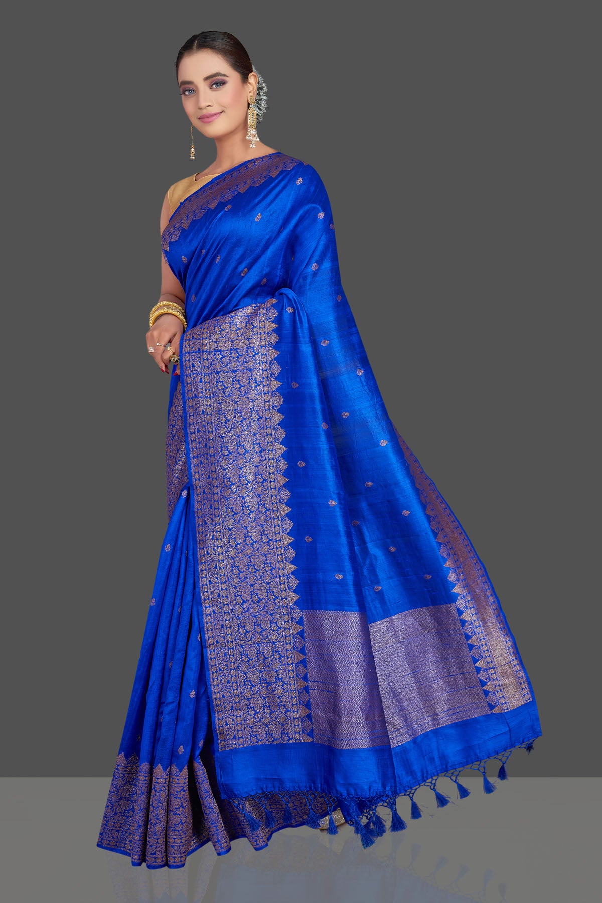 Buy stunning bright blue tussar Banarasi saree online in USA with antique zari border. Look your best on special occasions with stunning Banarasi saris, pure silk sarees, tussar sarees, handwoven sarees from Pure Elegance Indian saree store in USA.-pallu