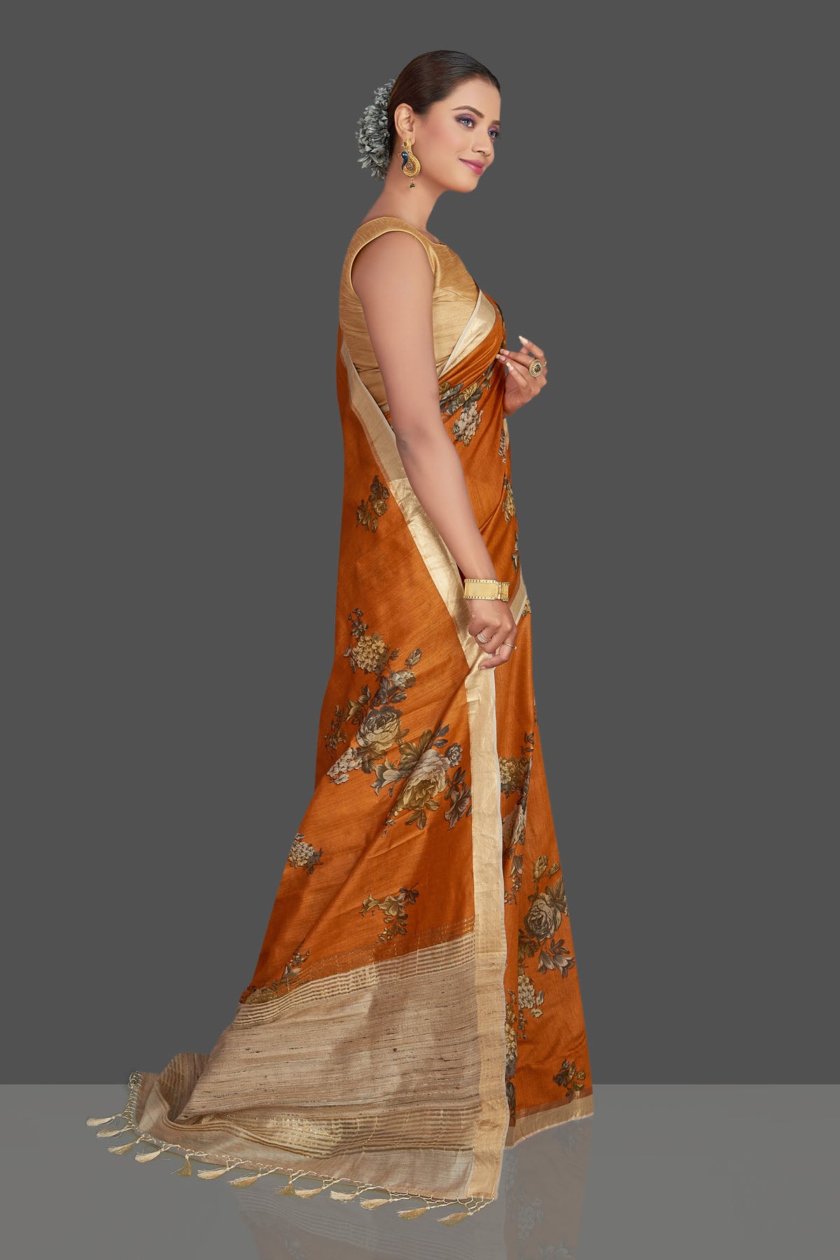 Buy stunning dark orange floral print tussar Banarasi saree online in USA with beige pallu. Look your best on special occasions with stunning Banarasi saris, pure silk saris, tussar sarees, handwoven sarees from Pure Elegance Indian saree store in USA.-side