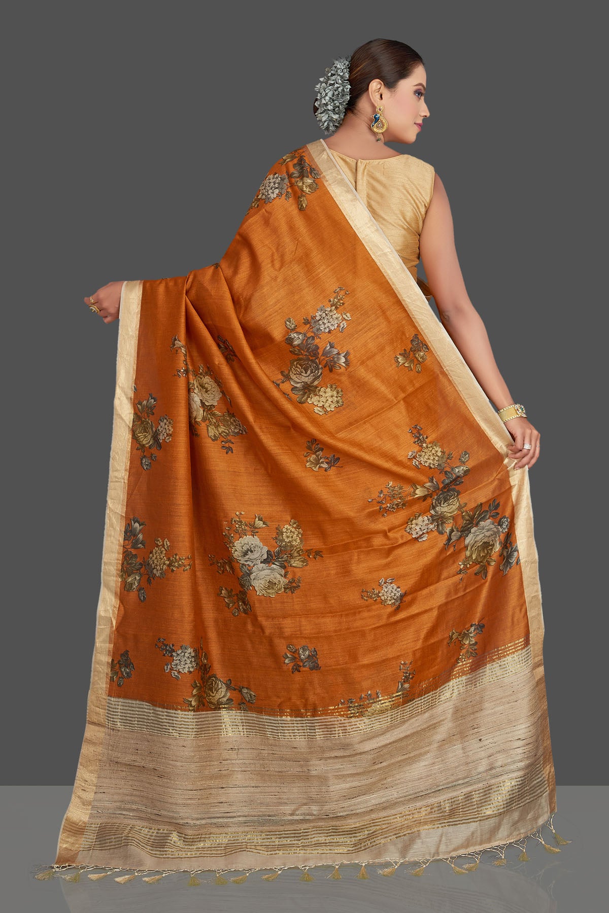 Buy stunning dark orange floral print tussar Banarasi saree online in USA with beige pallu. Look your best on special occasions with stunning Banarasi saris, pure silk saris, tussar sarees, handwoven sarees from Pure Elegance Indian saree store in USA.-back