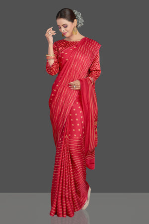 Buy gorgeous red printed modal silk sari online in USA. Make your presence felt on special occasions in beautiful embroidered sarees, handwoven sarees, pure silk sarees, tussar sarees from Pure Elegance Indian saree store in USA.-side