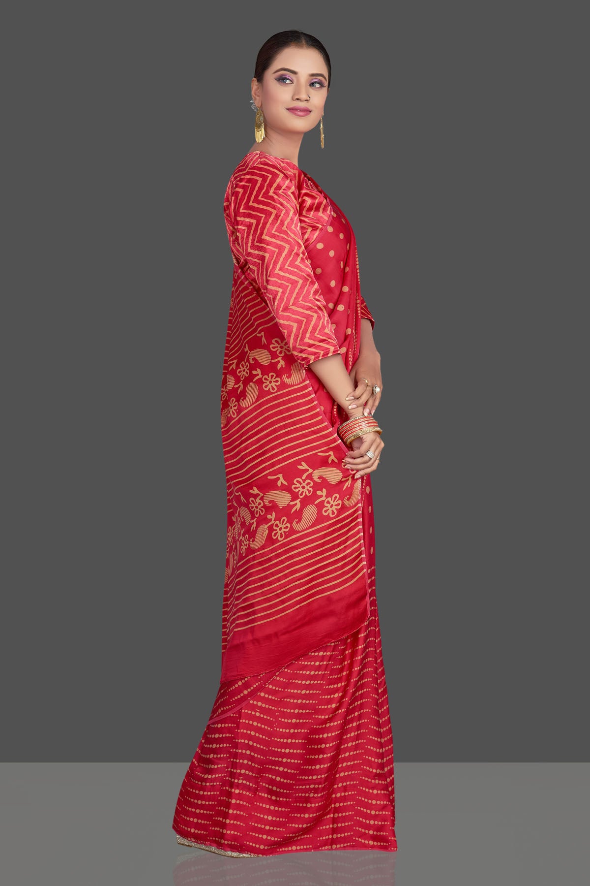 Buy gorgeous red printed modal silk sari online in USA. Make your presence felt on special occasions in beautiful embroidered sarees, handwoven sarees, pure silk sarees, tussar sarees from Pure Elegance Indian saree store in USA.-right