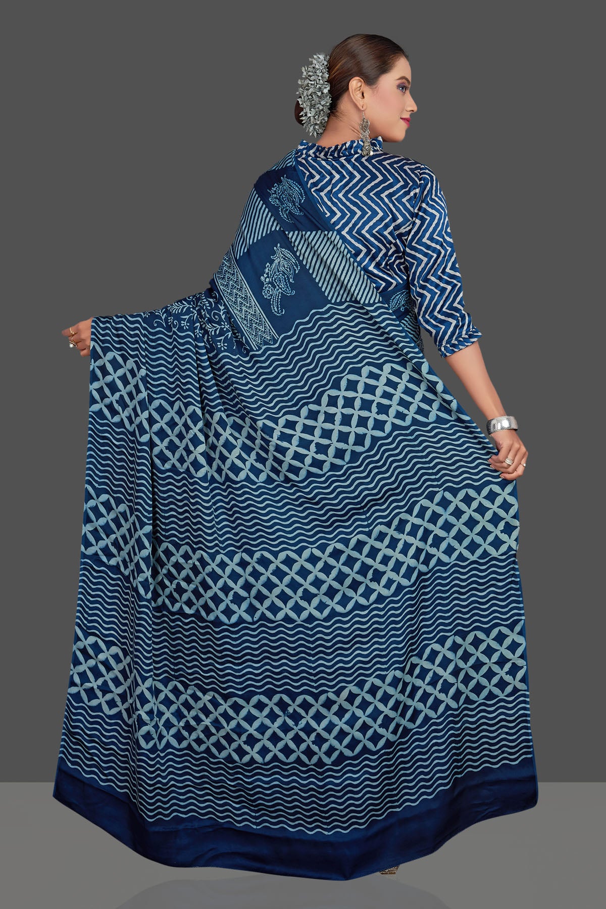 Shop stunning dark blue mix print modal silk saree online in USA. Make your presence felt on special occasions in beautiful embroidered sarees, handwoven sarees, pure silk sarees, tussar sarees from Pure Elegance Indian saree store in USA.-back