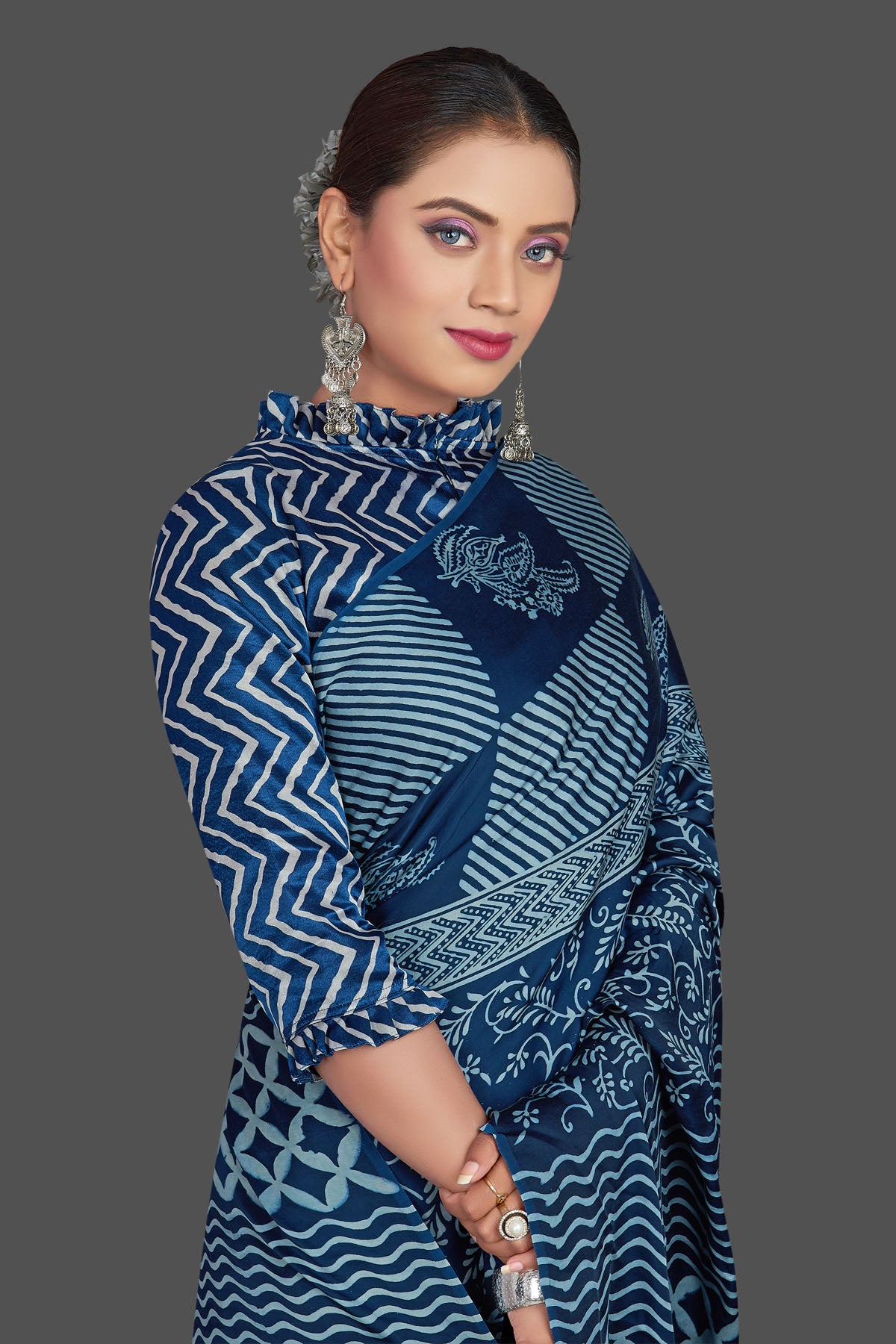 Shop stunning dark blue mix print modal silk saree online in USA. Make your presence felt on special occasions in beautiful embroidered sarees, handwoven sarees, pure silk sarees, tussar sarees from Pure Elegance Indian saree store in USA.-closeup