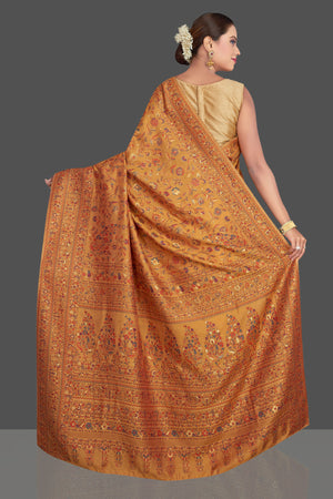 Buy stunning mustard yellow Kani weave sari online in USA. Make your presence felt on special occasions in beautiful embroidered sarees, handwoven saris, pure silk saris, tussar sarees from Pure Elegance Indian saree store in USA.-back