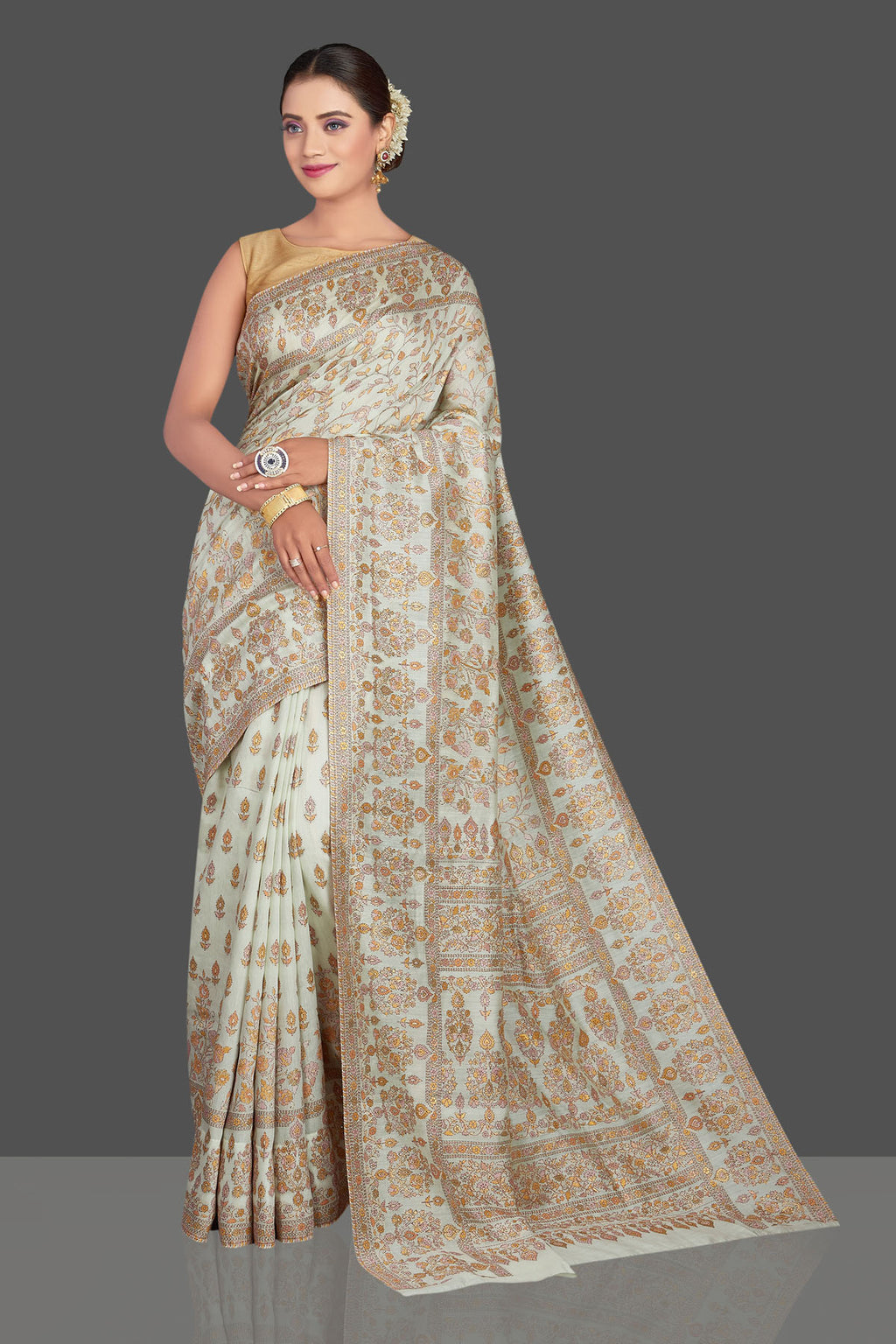 Buy stunning mint green Kani weave sari online in USA. Make your presence felt on special occasions in beautiful embroidered sarees, handwoven saris, pure silk saris, tussar sarees from Pure Elegance Indian saree store in USA.-full view