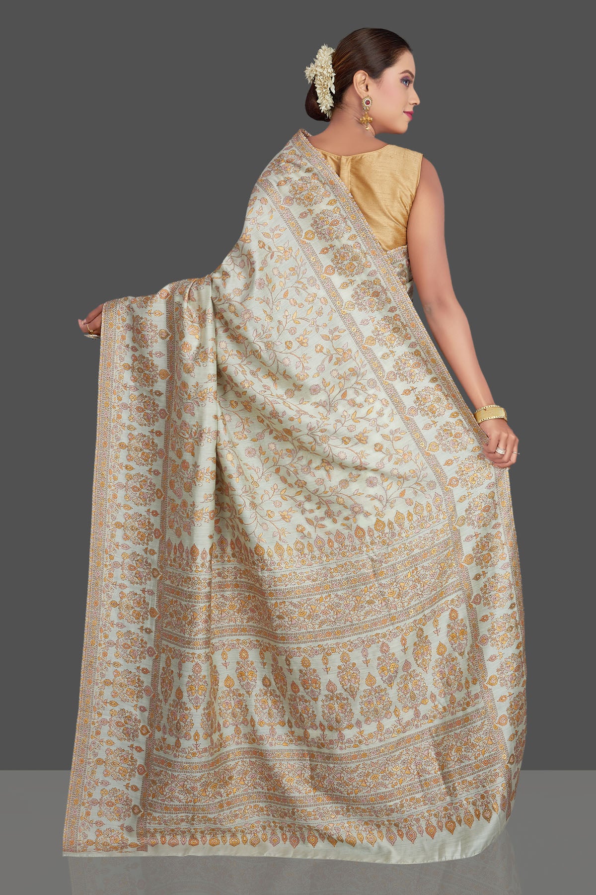 Buy stunning mint green Kani weave sari online in USA. Make your presence felt on special occasions in beautiful embroidered sarees, handwoven saris, pure silk saris, tussar sarees from Pure Elegance Indian saree store in USA.-back