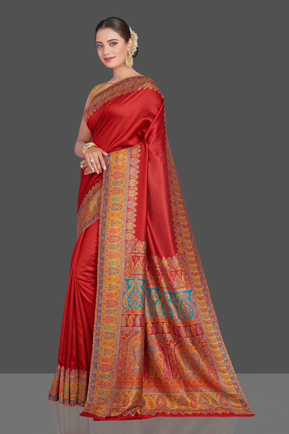 Buy stunning red Kani weave tussar muga silk sari online in USA. Make your presence felt on special occasions in beautiful embroidered sarees, handwoven saris, pure silk saris, tussar sarees from Pure Elegance Indian saree store in USA.-pallu