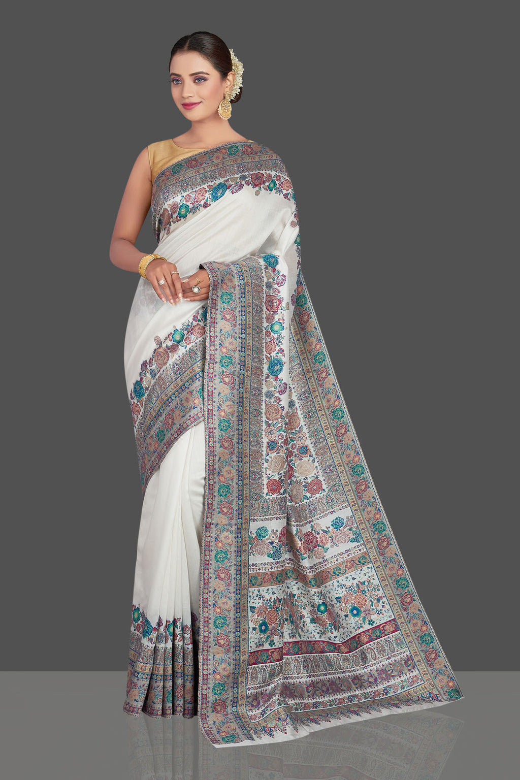 Buy stunning off-white Kani weave tussar muga silk sari online in USA. Make your presence felt on special occasions in beautiful embroidered sarees, handwoven saris, pure silk saris, tussar sarees from Pure Elegance Indian saree store in USA.-full view