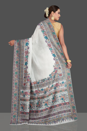 Buy stunning off-white Kani weave tussar muga silk sari online in USA. Make your presence felt on special occasions in beautiful embroidered sarees, handwoven saris, pure silk saris, tussar sarees from Pure Elegance Indian saree store in USA.-back