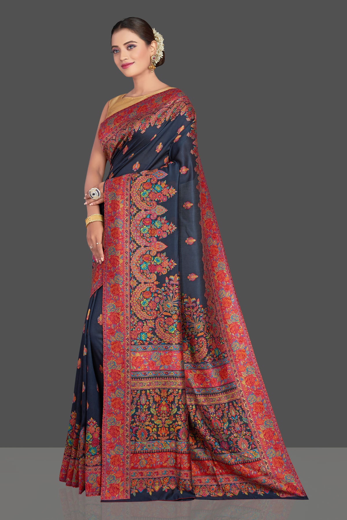 Buy beautiful navy blue tussar muga silk sari online in USA with Kani weave. Make your presence felt on special occasions in beautiful embroidered sarees, handwoven saris, pure silk saris, tussar sarees from Pure Elegance Indian saree store in USA.-pallu