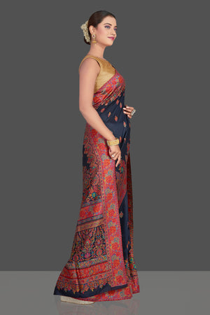 Buy beautiful navy blue tussar muga silk sari online in USA with Kani weave. Make your presence felt on special occasions in beautiful embroidered sarees, handwoven saris, pure silk saris, tussar sarees from Pure Elegance Indian saree store in USA.-left