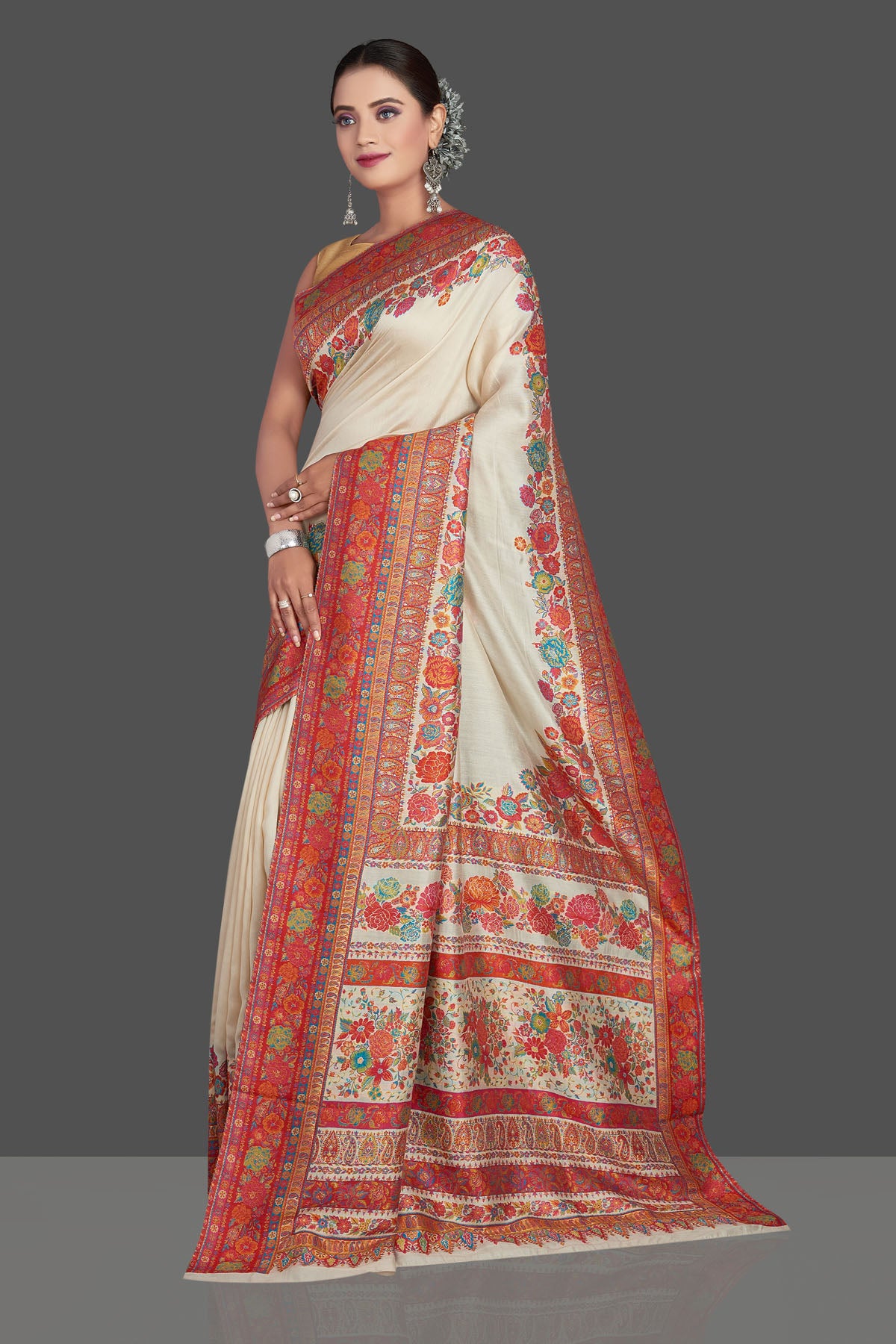 Shop stunning cream Kani weave tussar muga silk saree online in USA. Make your presence felt on special occasions in beautiful embroidered sarees, handwoven saris, pure silk saris, tussar sarees from Pure Elegance Indian saree store in USA.-pallu