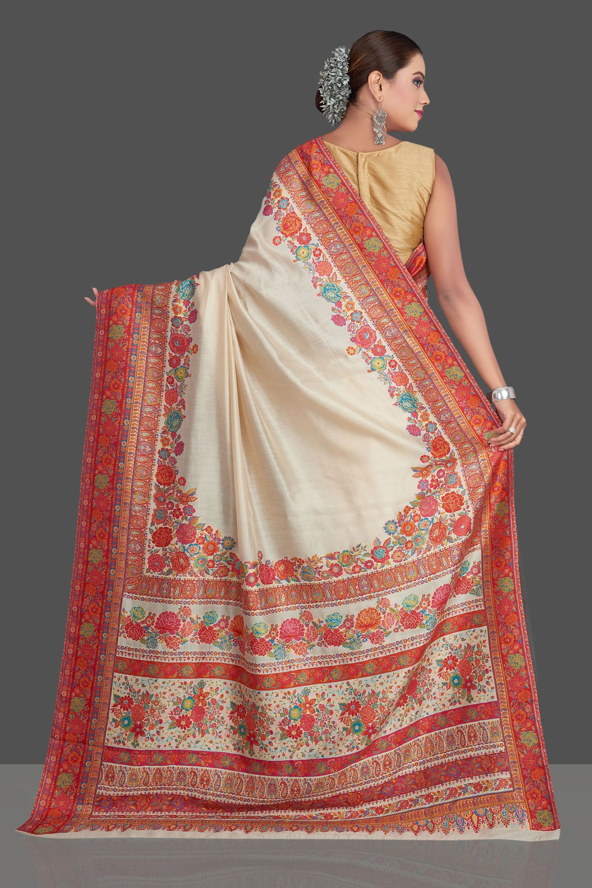 Shop stunning cream Kani weave tussar muga silk saree online in USA. Make your presence felt on special occasions in beautiful embroidered sarees, handwoven saris, pure silk saris, tussar sarees from Pure Elegance Indian saree store in USA.-back