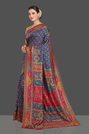 Buy gorgeous blue tussar muga silk saree online in USA with multicolor Kani weave. Make your presence felt on special occasions in beautiful embroidered sarees, handwoven saris, pure silk saris, tussar sarees from Pure Elegance Indian saree store in USA.-pallu