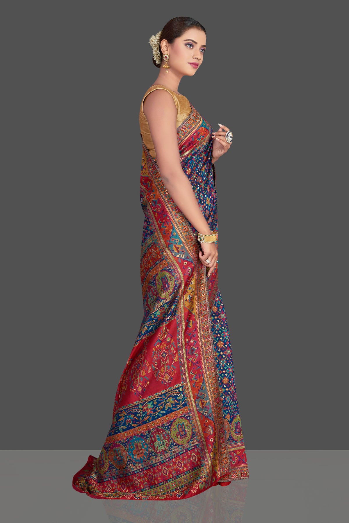 Buy gorgeous blue tussar muga silk saree online in USA with multicolor Kani weave. Make your presence felt on special occasions in beautiful embroidered sarees, handwoven saris, pure silk saris, tussar sarees from Pure Elegance Indian saree store in USA.-right