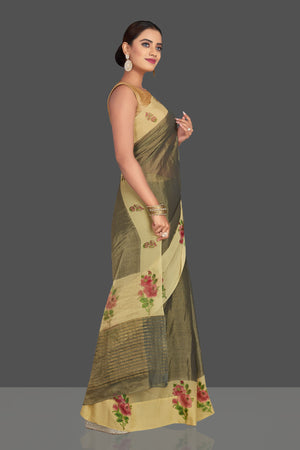 Shop stunning dull gold tissue saree online in USA with floral print border. Shop designer sarees, printed sarees, embroidered sarees, crepe sarees in USA from Pure Elegance Indian fashion store in USA.-side