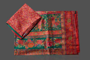 Shop stunning dark green Kani weave tussar muga sari online in USA. Shop designer sarees, printed sarees, embroidered sarees, crepe sarees in USA from Pure Elegance Indian fashion store in USA.-blouse