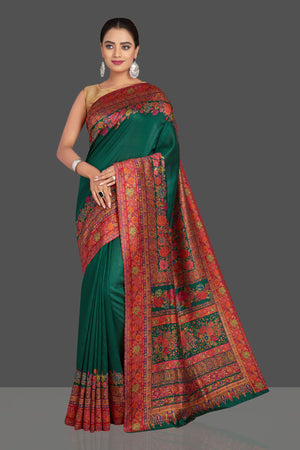 Shop stunning dark green Kani weave tussar muga sari online in USA. Shop designer sarees, printed sarees, embroidered sarees, crepe sarees in USA from Pure Elegance Indian fashion store in USA.-pallu