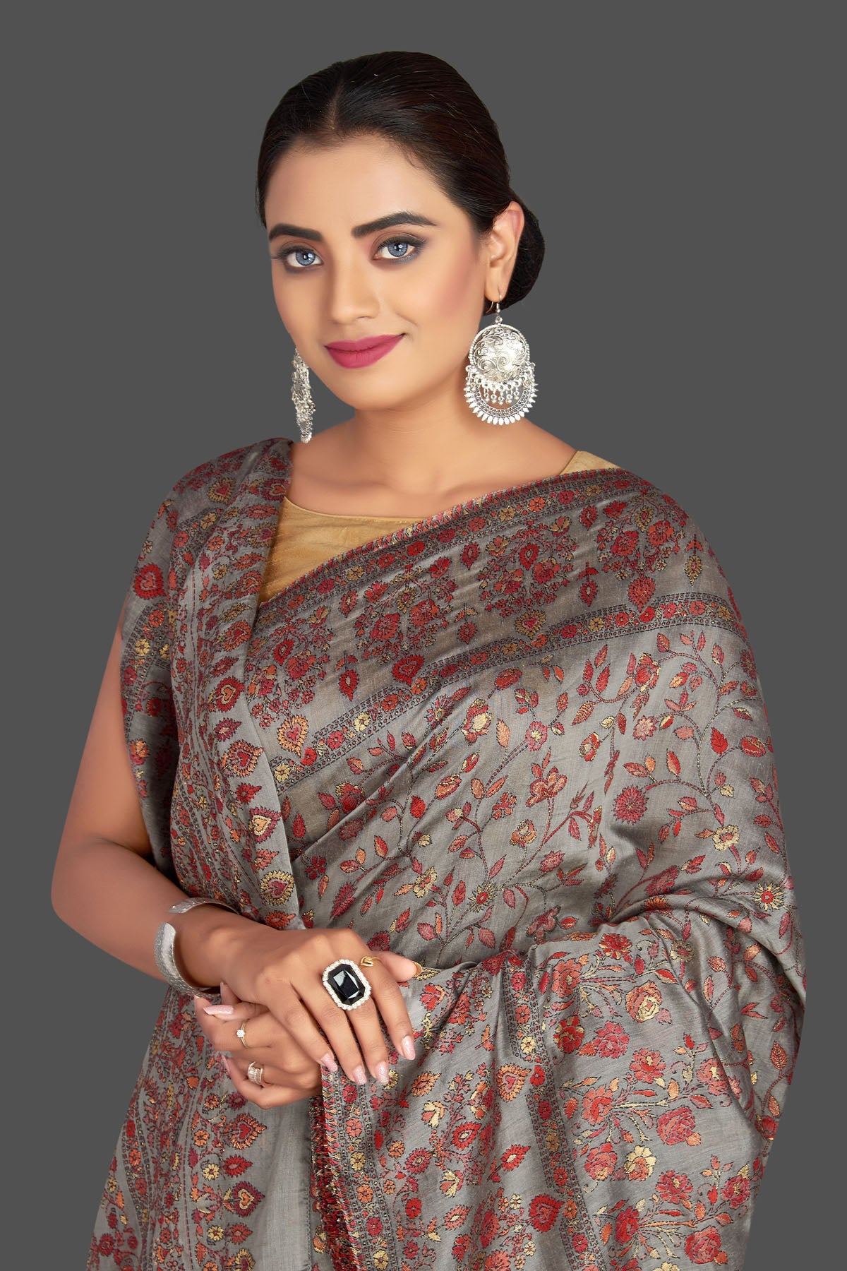 Buy stunning grey Kani weave tussar muga sari online in USA. Shop designer sarees, printed sarees, embroidered sarees, crepe sarees, handwoven silk sarees in USA from Pure Elegance Indian fashion store in USA.-closeup