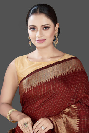Buy stunning brown check matka silk saree online in USA with golden zari border. Be the talk of the occasion in exquisite designer sarees, pure silk sarees, tussar saris, embroidered sarees, handloom saris from Pure Elegance Indian fashion store in USA.-closeup