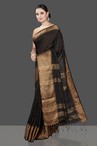 Shop gorgeous black matka silk sari online in USA with golden zari border. Be the talk of the occasion in exquisite designer sarees, pure silk sarees, tussar saris, embroidered sarees, handloom sarees from Pure Elegance Indian fashion store in USA.-full view