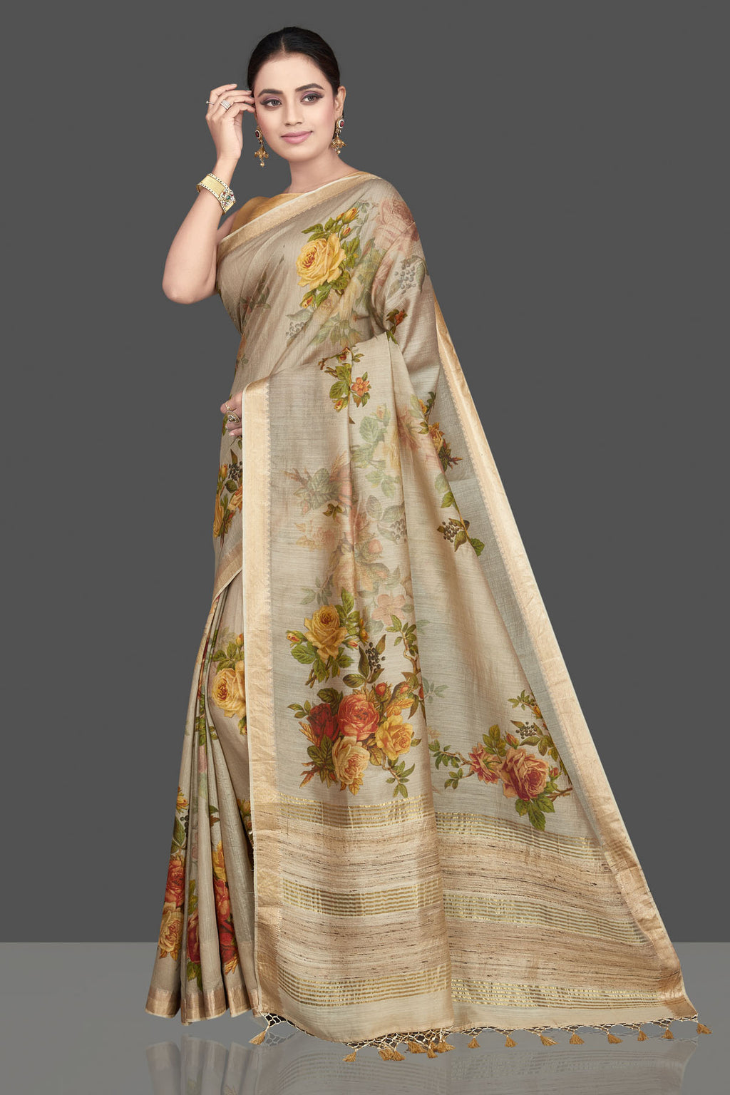 Shop gorgeous beige floral print Muga silk sari online in USA with golden border. Look attractive on weddings and parties in beautiful designer sarees, pure silk sarees, handwoven saris, embroidered sarees, zari work sarees from Pure Elegance Indian saree store in USA. -full view