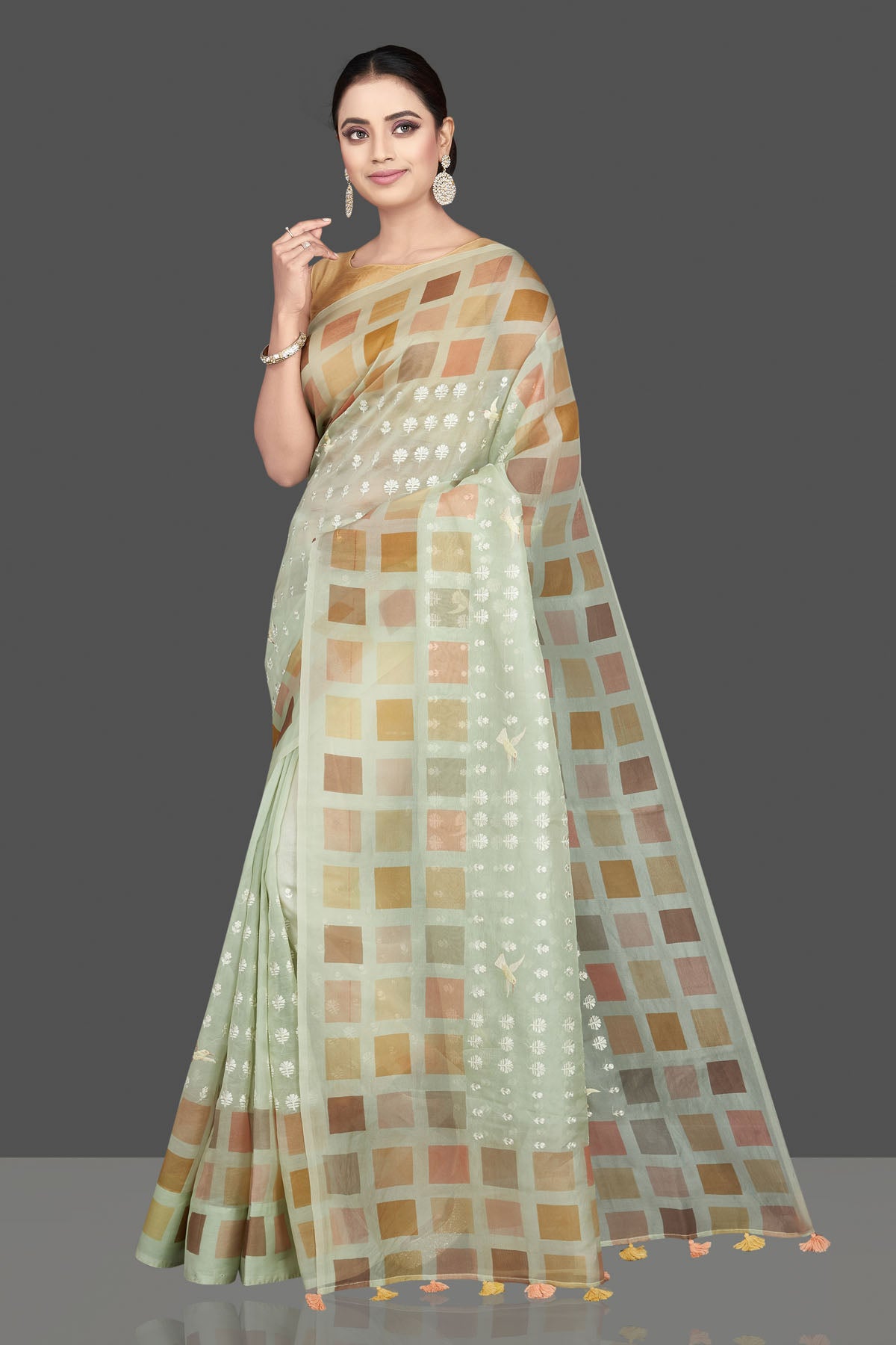 Buy beautiful mint green organza saree online in USA with multicolor square border. Look attractive on weddings and parties in beautiful designer sarees, pure silk sarees, handwoven saris, embroidered sarees, zari work sarees from Pure Elegance Indian saree store in USA.-pallu