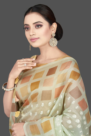 Buy beautiful mint green organza saree online in USA with multicolor square border. Look attractive on weddings and parties in beautiful designer sarees, pure silk sarees, handwoven saris, embroidered sarees, zari work sarees from Pure Elegance Indian saree store in USA.-closeup