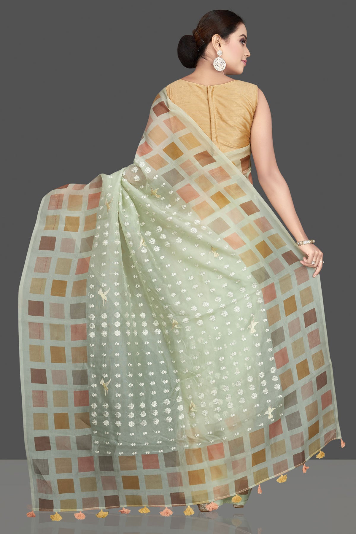 Buy beautiful mint green organza saree online in USA with multicolor square border. Look attractive on weddings and parties in beautiful designer sarees, pure silk sarees, handwoven saris, embroidered sarees, zari work sarees from Pure Elegance Indian saree store in USA.-back