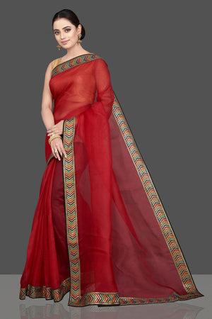 Shop gorgeous red organza saree online in USA with golden border. Look attractive on weddings and parties in beautiful designer sarees, pure silk sarees, handwoven saris, embroidered sarees, zari work sarees from Pure Elegance Indian saree store in USA.-pallu
