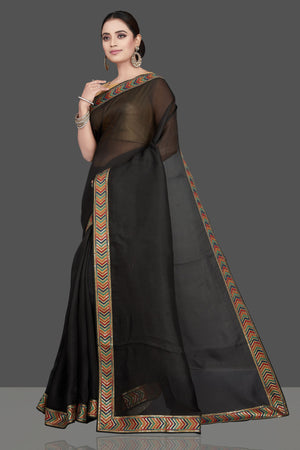 Shop beautiful black organza saree online in USA with golden border. Look attractive on weddings and parties in beautiful designer sarees, pure silk sarees, handwoven sarees, embroidered sarees, zari work sarees from Pure Elegance Indian saree store in USA.-pallu