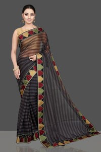 Buy gorgeous grey and black organza silk saree online in USA with designer border. Look attractive on weddings and parties in beautiful designer sarees, pure silk sarees, handwoven sarees, embroidered sarees, zari work sarees from Pure Elegance Indian saree store in USA.-full view