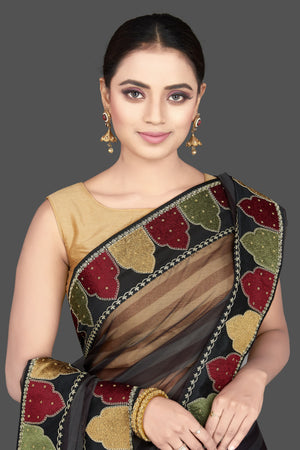 Buy gorgeous grey and black organza silk saree online in USA with designer border. Look attractive on weddings and parties in beautiful designer sarees, pure silk sarees, handwoven sarees, embroidered sarees, zari work sarees from Pure Elegance Indian saree store in USA.-closeup