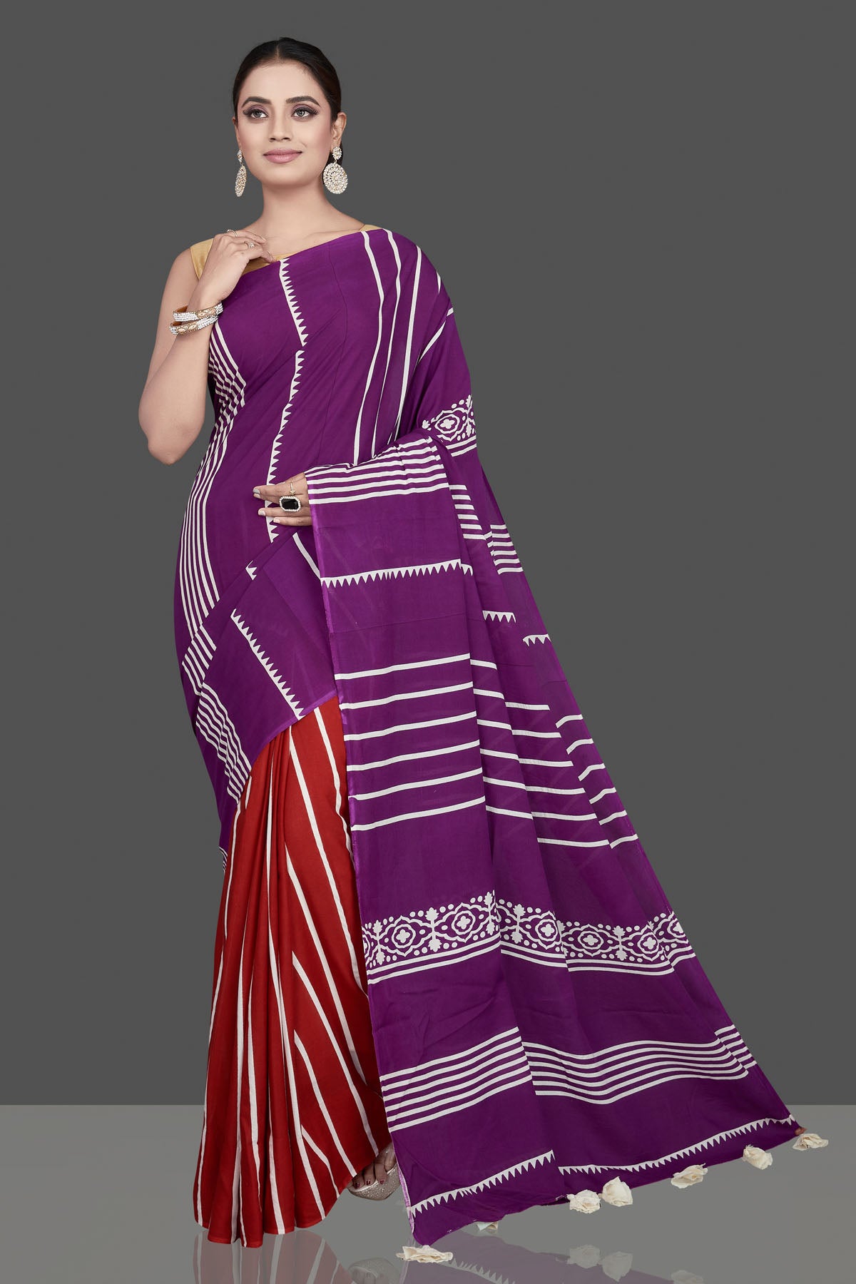 Buy gorgeous purple and red striped modal silk saree online in USA. Be the highlight of the occasion in beautiful pure silk saree, designer saris, handloom sarees, embroidered sarees, Kanchipuram sarees, Banarasi saris from Pure Elegance Indian saree store in USA.-front